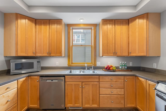 1096 14th Ave SE, Minneapolis, MN 55414 - kitchen featuring stainless steel appliances and dark countertops