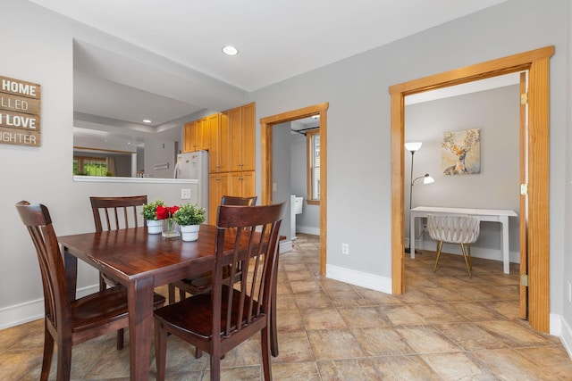 1096 14th Ave SE, Minneapolis, MN 55414 - dining space featuring recessed lighting and stone finish floors
