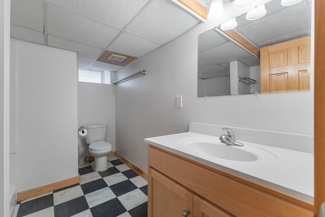 1096 14th Ave SE, Minneapolis, MN 55414 - full bath featuring tile patterned floors, vanity, and a drop ceiling