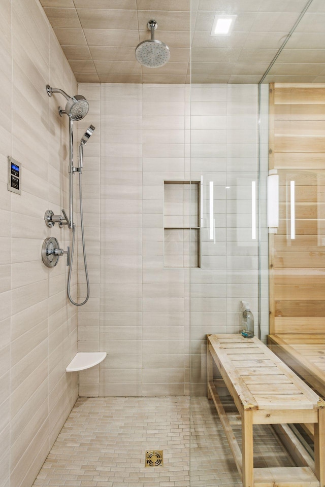 bathroom featuring tiled shower