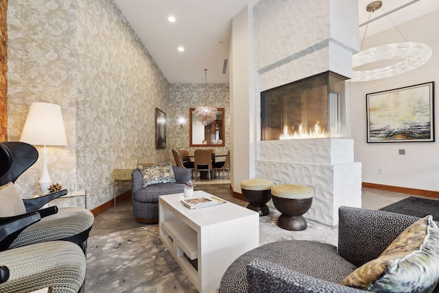 living room with a towering ceiling