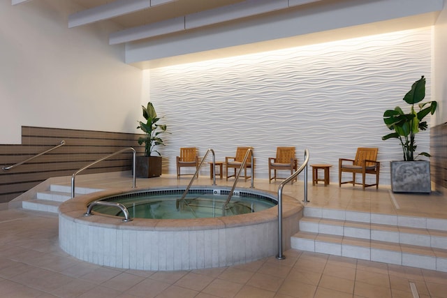 view of swimming pool featuring an indoor in ground hot tub