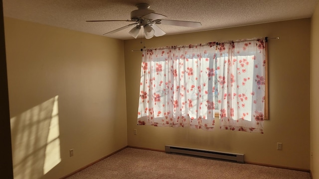 unfurnished room with light carpet, a textured ceiling, ceiling fan, and a baseboard heating unit