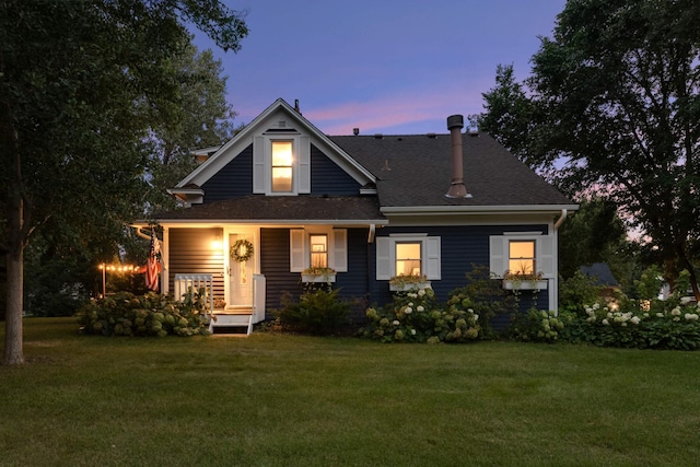 view of front of house with a lawn
