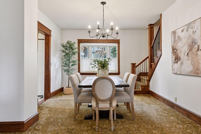 dining area featuring baseboards, a chandelier, and stairway