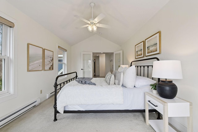 carpeted bedroom featuring vaulted ceiling, a ceiling fan, and a baseboard radiator