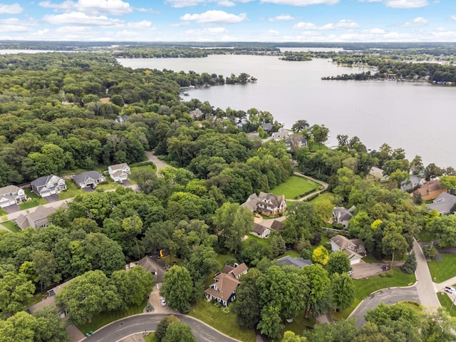 bird's eye view featuring a residential view and a water view