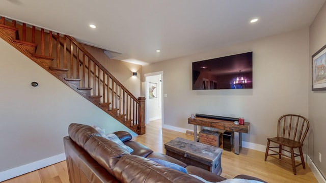 living room with light hardwood / wood-style floors