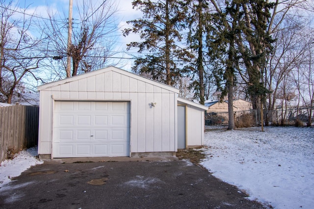 view of snow covered garage