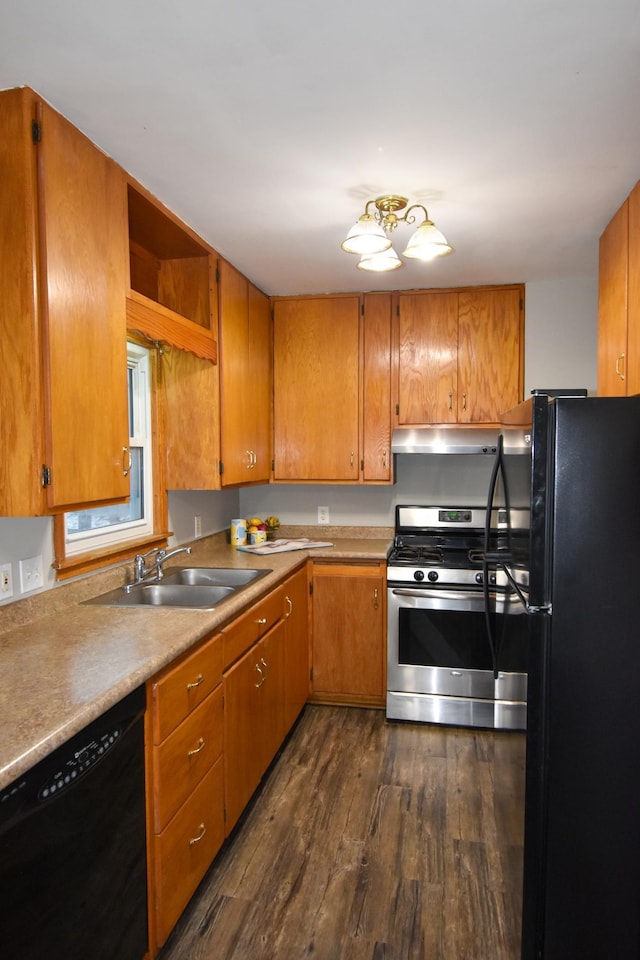 kitchen featuring sink, dark hardwood / wood-style floors, and black appliances