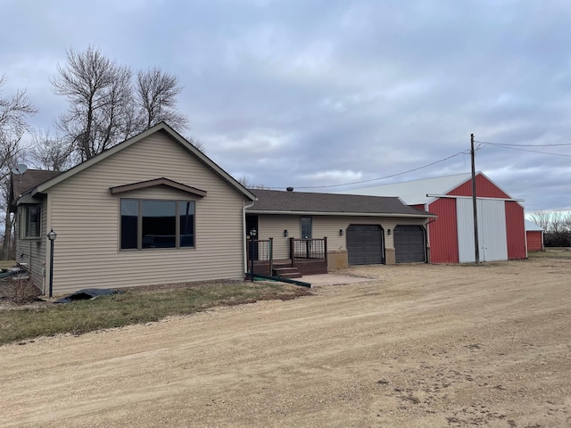 ranch-style home with a garage