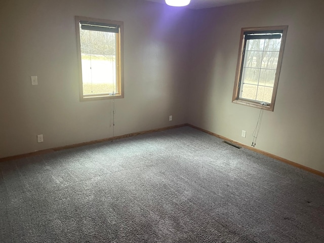 view of carpeted spare room