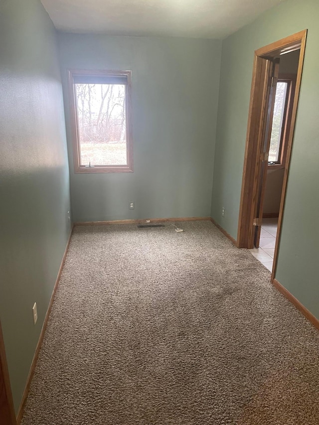 view of carpeted spare room