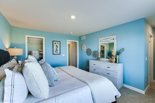 bedroom featuring light colored carpet