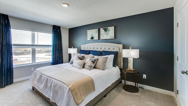 carpeted bedroom with a textured ceiling