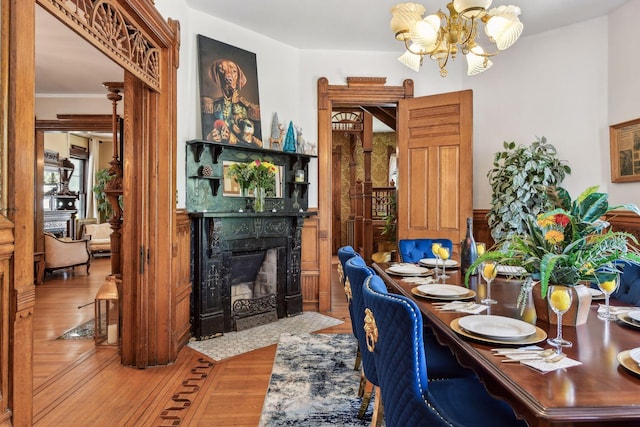 home office with crown molding, an inviting chandelier, and hardwood / wood-style flooring