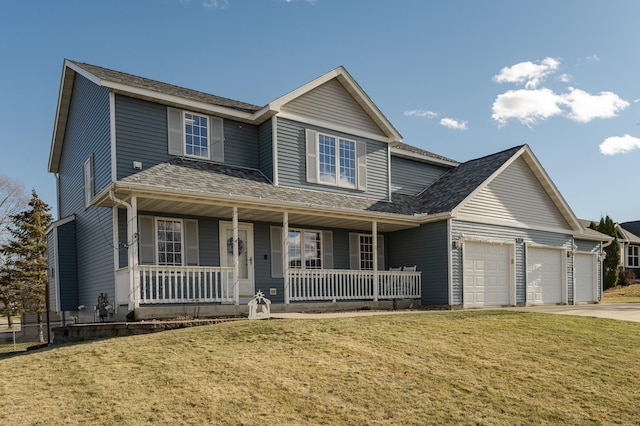 view of front of house with covered porch, a garage, and a front lawn