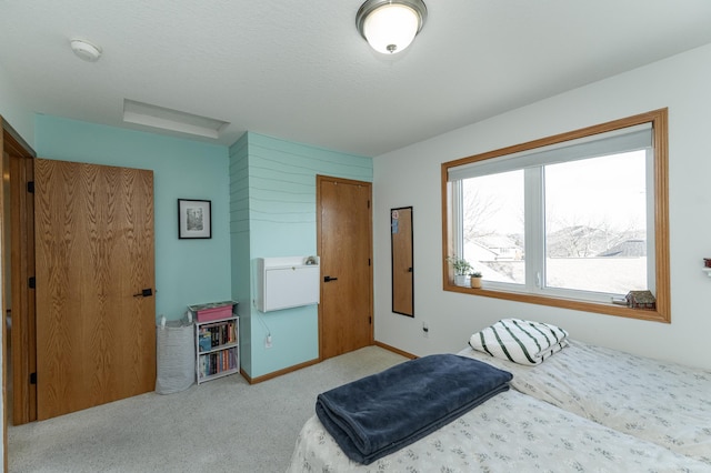 bedroom with light colored carpet