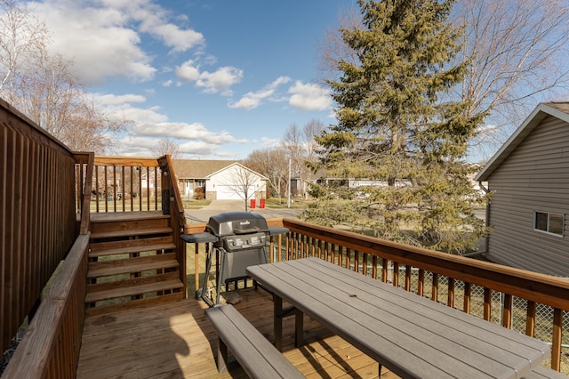 wooden terrace featuring area for grilling