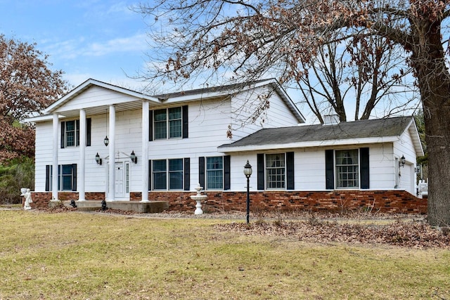 view of front facade featuring a front yard