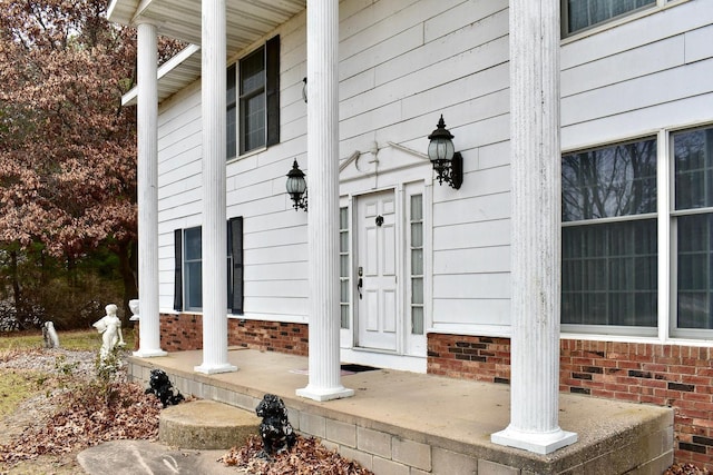 entrance to property with a porch