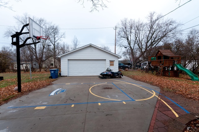 view of sport court featuring a playground