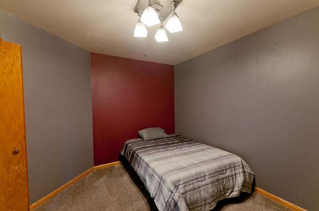 bedroom featuring carpet