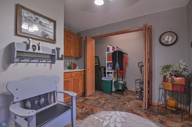 429 Bridge Ave, Warren, MN 56762 - kitchen with stone finish flooring, brown cabinets, and light countertops