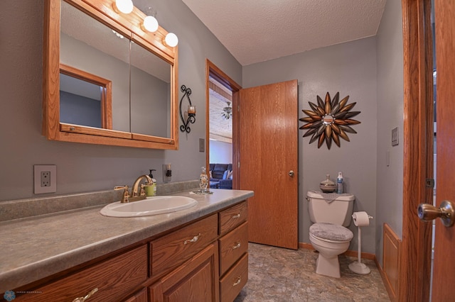 429 Bridge Ave, Warren, MN 56762 - bathroom featuring vanity and a textured ceiling