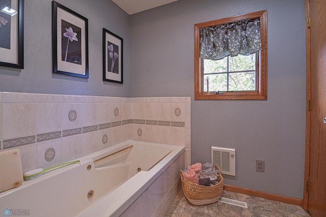 429 Bridge Ave, Warren, MN 56762 - full bath featuring a jetted tub and baseboards