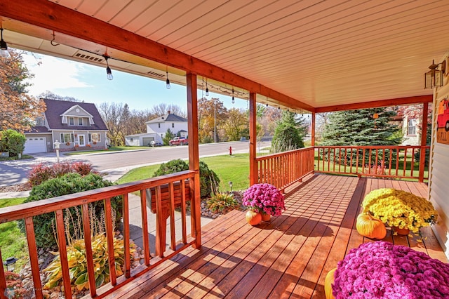 429 Bridge Ave, Warren, MN 56762 - wooden porch with a residential view
