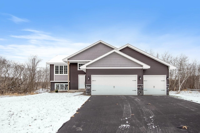 view of front of house with a garage