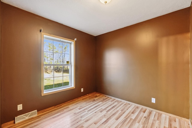 63219 Great River Rd, Jacobson, MN 55752 - unfurnished room featuring light hardwood / wood-style floors and plenty of natural light