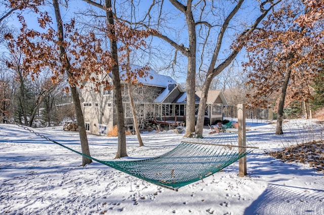 view of yard layered in snow