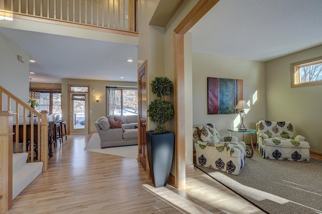 interior space with light hardwood / wood-style flooring and a wealth of natural light