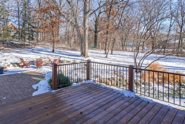 view of snow covered deck