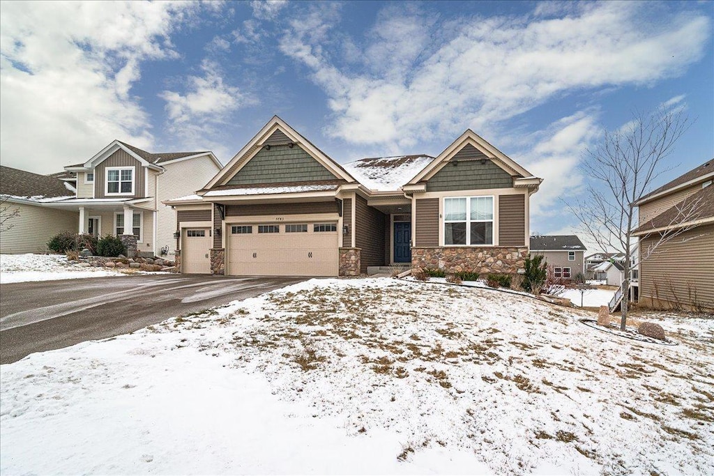 craftsman house with a garage