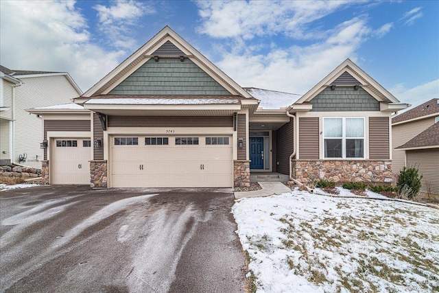 craftsman-style house featuring a garage