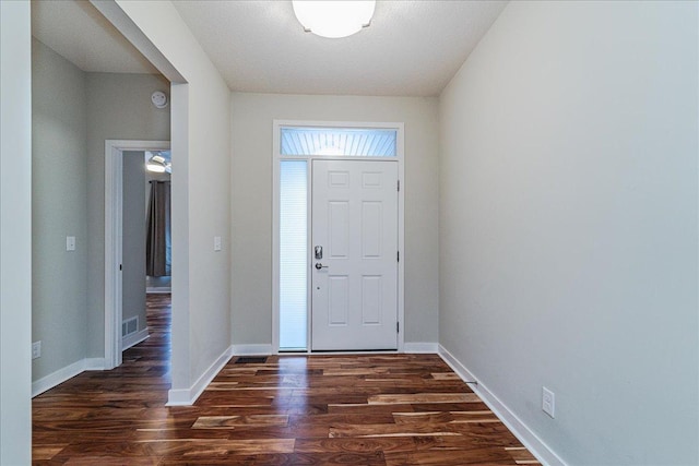 entryway featuring dark hardwood / wood-style floors