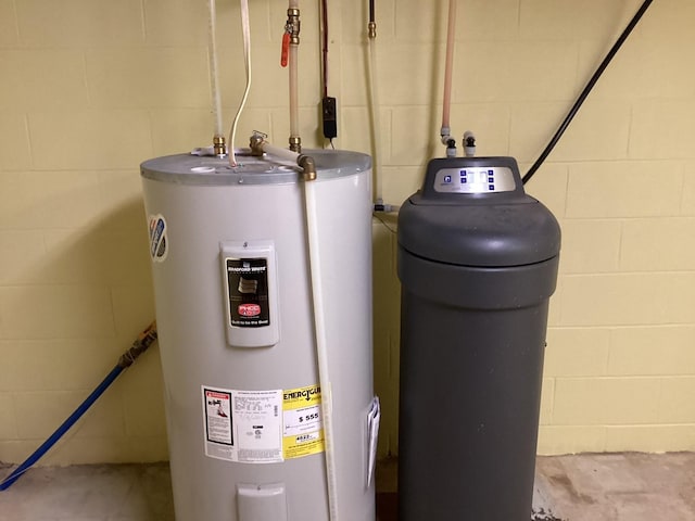 utility room with water heater