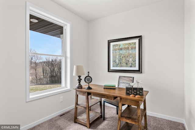 view of carpeted home office