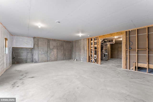 basement featuring heating unit