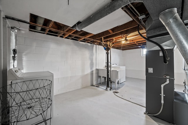 basement with independent washer and dryer and heating unit