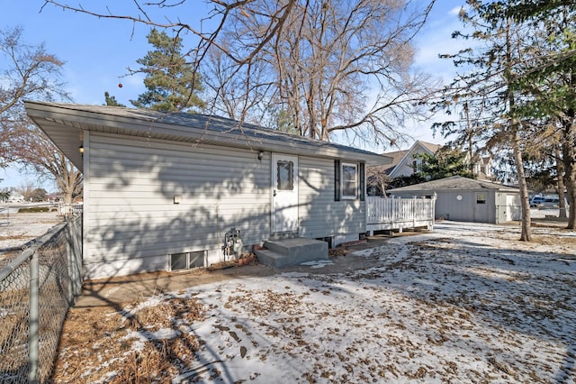 view of front of house featuring a wooden deck