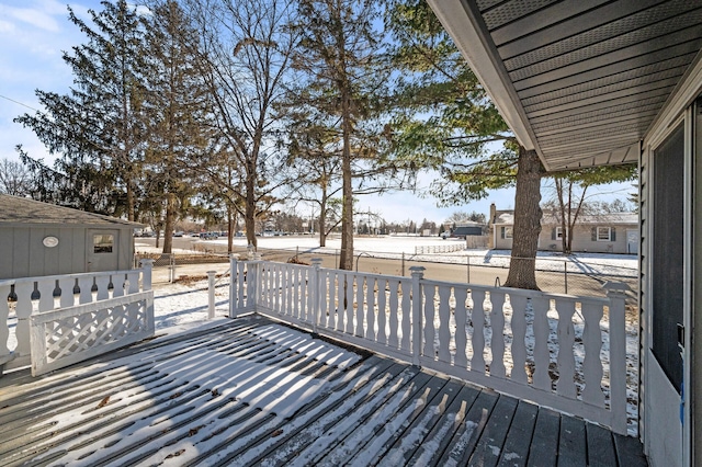 view of snow covered deck