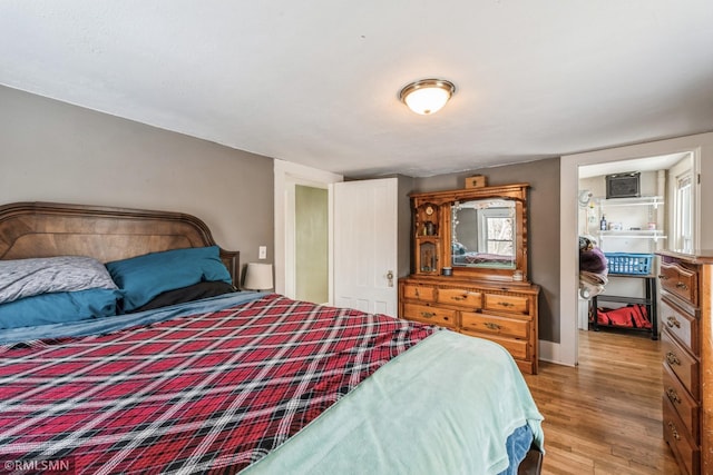 bedroom featuring light hardwood / wood-style floors