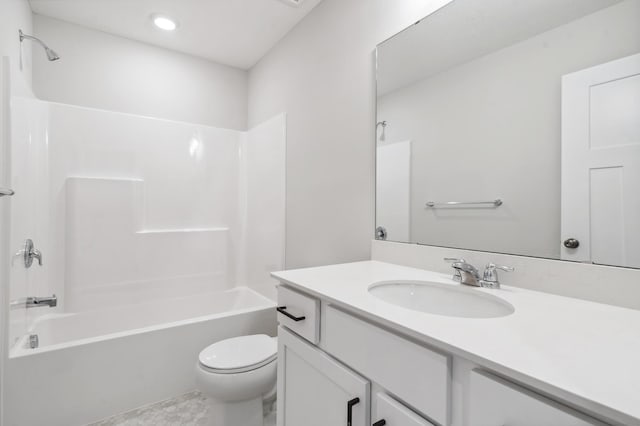 full bathroom with shower / tub combination, vanity, and toilet