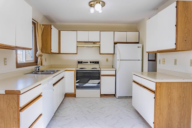 kitchen featuring sink, white cabinets, and white appliances