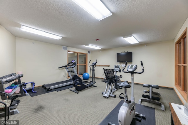 5650 Boone Ave N Unit 321, New Hope, MN 55428 - workout area with a textured ceiling