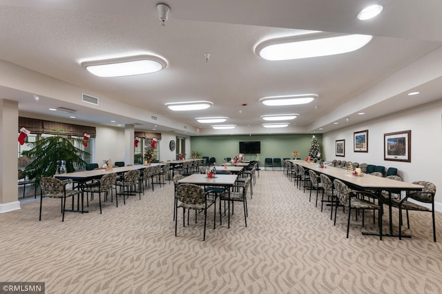 5650 Boone Ave N Unit 321, New Hope, MN 55428 - carpeted dining area featuring baseboards